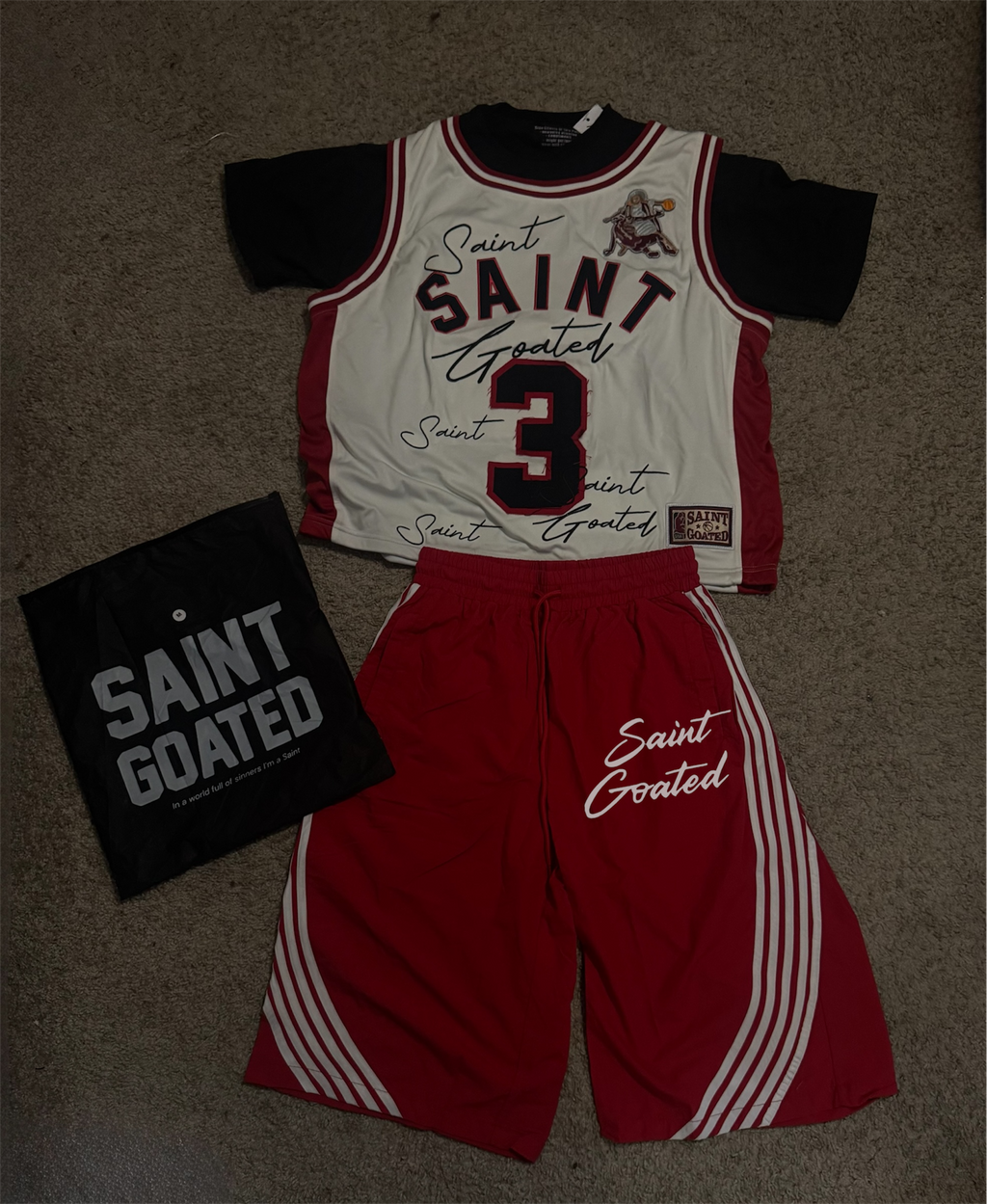 Saint Goated striped shorts